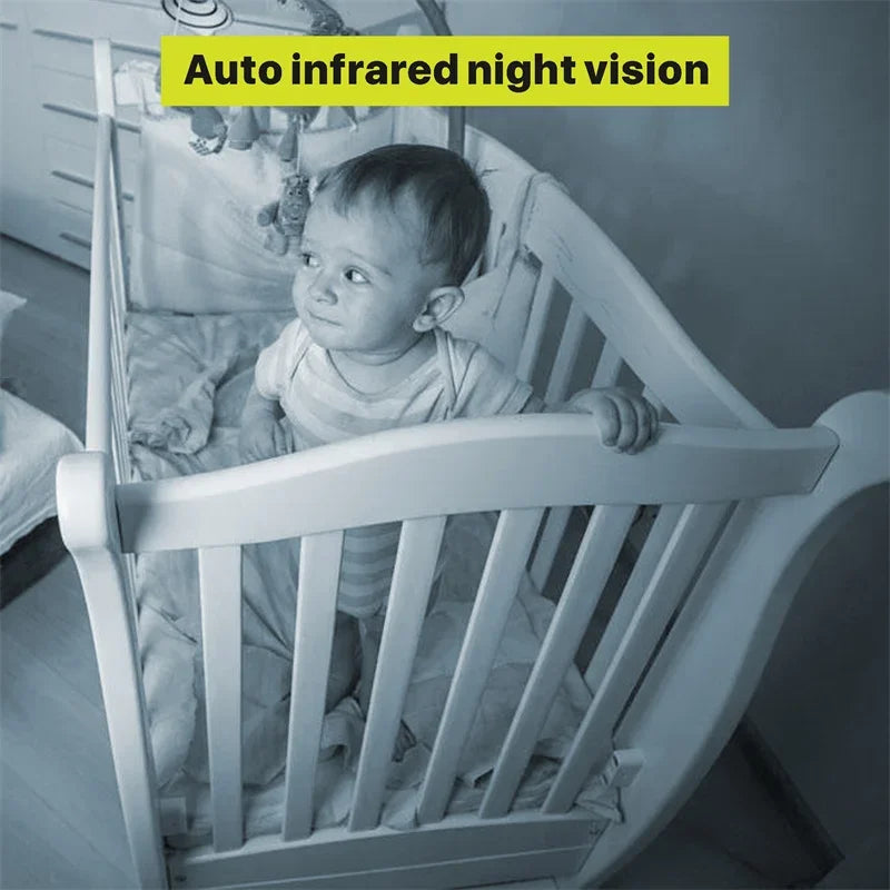 Baby in a crib with text 'Auto infrared night vision' at the top.